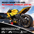 Self-retracting ratchet strap securing a motorcycle